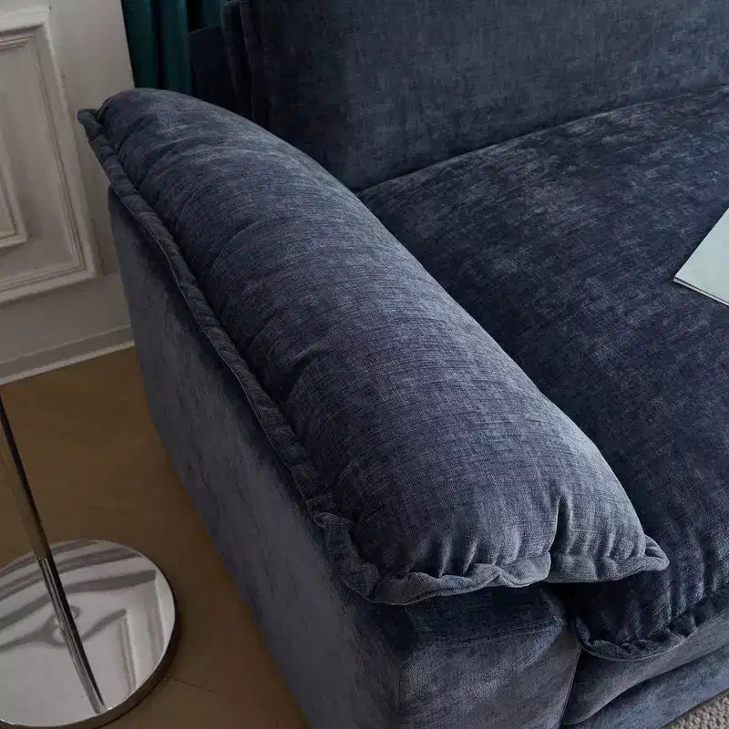 Divano moderno a L a 3 posti con braccioli e piano imbottito da 120 pollici, colore beige con pouf
